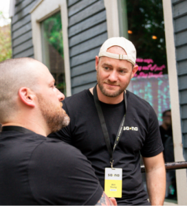 image: two Sana employees talking